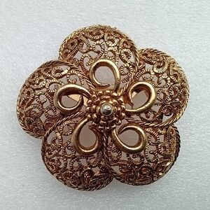 Vintage, likely Crown Trifary Gold Tone Brooch Filigree Design In A Flower Shape